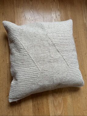 CB2 wool zigzag motif “Bias” pillow with down inset